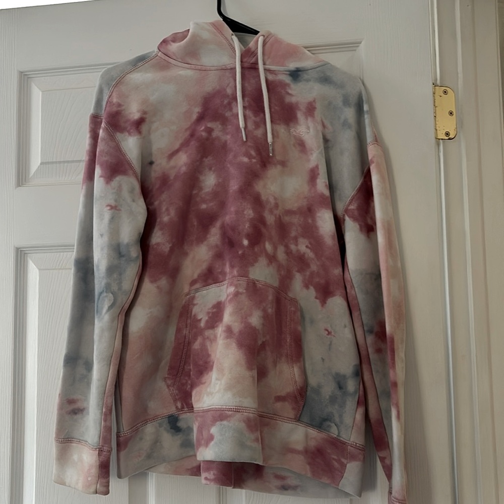 Size small Hollister hoodie. Good condition. Pink, Blue and white.